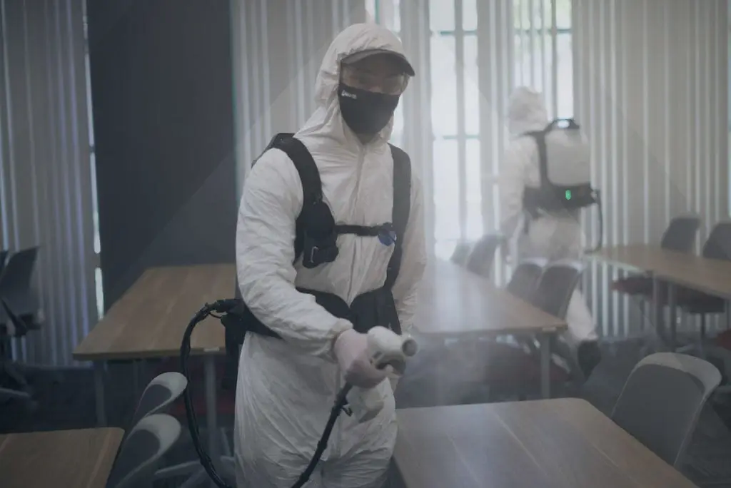 Janitor in full Personal Protective Equipment